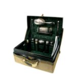 A Mappin & Webb Dark Green Leather Lady's Travelling Case, initialled "C.E.A." (carrying handle