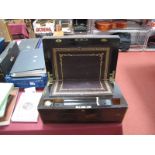 A Victorian Coromandel Writing Slope, fitted interior with gilt tooled black leather scriver, the