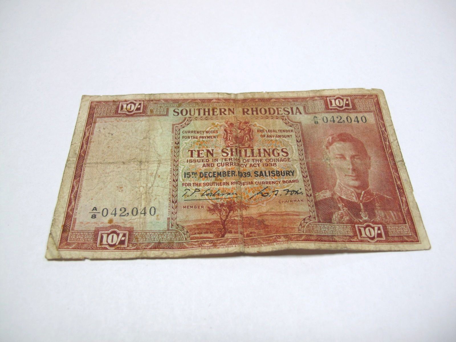 A Low Grade and Stained Southern Rhodesia Ten Shilling banknote, 15th December 1939, Salisbury,