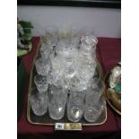 A Circular Salver, decanter, quantity of drinking glasses:- One Tray