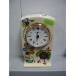 A Moorcroft Pottery Clock in the Stitch in Time Design by Nicola Slaney.