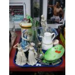 A Leonardo Collection Seated Model Lady, on oval plinth, two Regal House figurines, Carlton Ware and