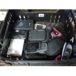 An assortment of mobile telephones (various makes/models), digital cameras, Nintendo DS Lite, Pebble