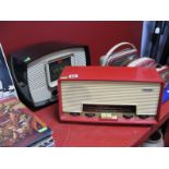 A Circa 1957 Murphy Model U572 Radio, in red plastic with ivory grille, push button wave change,