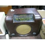 A Circa 1950 Bush DAC 90A Brown Mottled Bakelite Valve Radio with Expanded Central Circular Metal