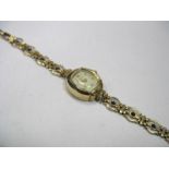 Rotary; A 9ct Gold Cased Lady's Wristwatch, the case with inset crown, to decorative stone set