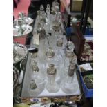 A Collection of Hallmarked Silver Mounted and Other Decorative Glass Bottles. (12)