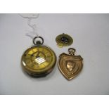 A 9ct Gold Shield Shape Medallion Pendant, inscribed "W & D.C.C.B.L. Winners Wigan C.C. 1917",