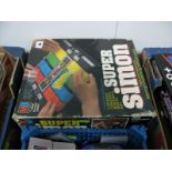 A Boxed Milton Bradley Super Simon Computer Controlled Game, with a boxed Grandstand "Convertors"