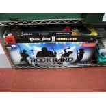 A Sony Playstation II/ III Rock Band Drum Kit, with microphones, with Guitar Hero III Legends of