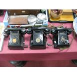 Two Black Bakelite Cased Anvil Telephones, with side wind handles, with Ericsson Mining Table