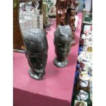 A Pair of Lignum Vitae Carved Busts of an African Man and Woman, each 16cms in height.