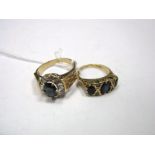 Two Sapphire Set Dress Rings, stamped "375". (2)