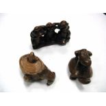 Two Japanese Carved Boxwood Netsukes and a similar group, three wise monkeys.