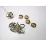 A 9ct Gold Oval Shell Carved Ring, together with two pairs of similar studs and a marcasite set