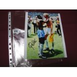 Pele Autograph, black pen signed on an image of him with Bobby Moore.