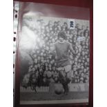 George Best Autograph, black pen signed on a black and white soccer annual picture of him