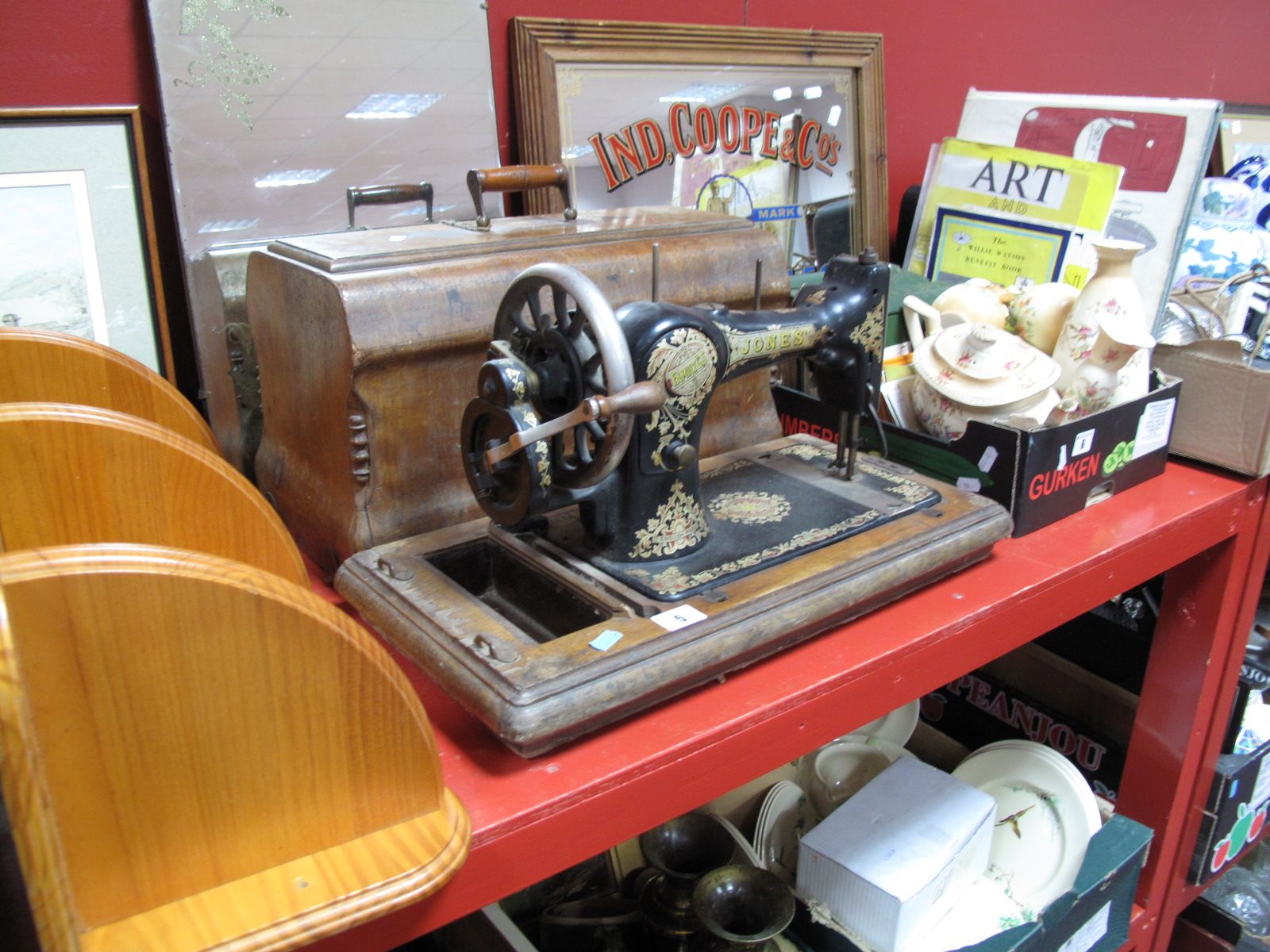 A Walnut Cased "Jones Family CS" Sewing Machine.