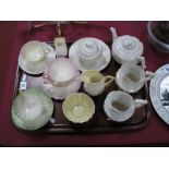 A Collection of Early XX Century and Later Belleek Tea Wares, including green and black