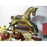 A Late XIX Century Early XX Century Child's Rocking Horse. Wooden horse in "dapple" finish and at