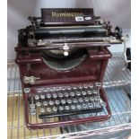 An Unusual Early XX Century Remington Typewriter, stamped LE56440, in burgundy.