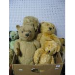 Four Mid XX Century Teddy Bears. One 65cms high, one 45cms high, one 60cms high, one 65cms high. All