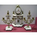 A French White Marble and Ormolu Mounted Clock Garniture, the cylinder movement striking on a