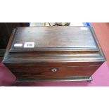 An Early XIX Century Rosewood Tea Caddy, of sarcophagus form, fitted interior with two lidded and