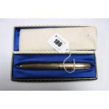 Parker; A 1/10 12ct R. Gold Fountain Pen, engine turned, inscribed "T. B. Haigh", in original box.