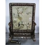An Early XX Century Chinese Hardwood and Mother of Pearl Inlaid Rectangular Table Screen, inset with