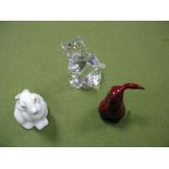 Royal Doulton Flambé Lop Eared Rabbit, model No. 1165; a Coalport seated rabbit and Royal Doulton