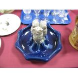 Michael Anderson & Son; A Danish Ceramic Centrepiece, the dark blue bowl of shaped circular design