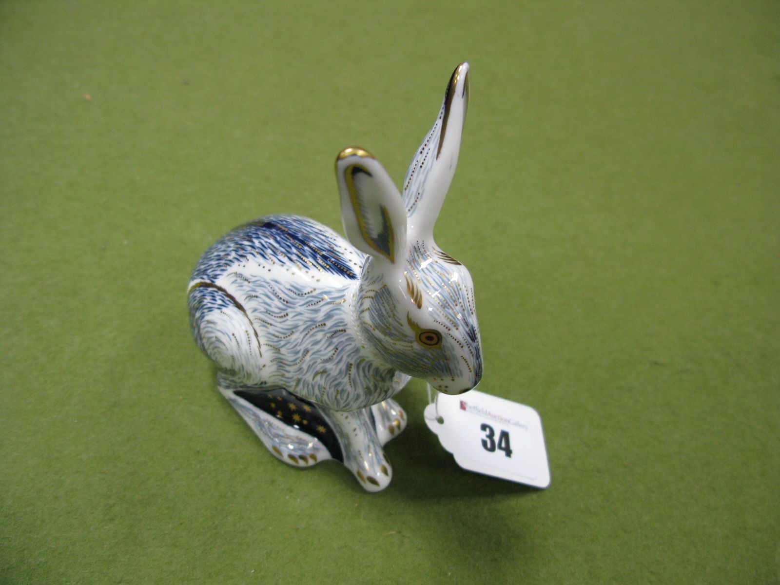 A Royal Crown Derby Paperweight, modelled as Starlight Hare, gold stopper, exclusively produced