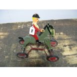 A 1930's Tri-ang Pullalong Toy of a Huntsman on a Horse. Wood and metal.