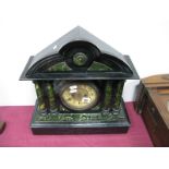 A XIX Century Ebonised Wooden Cased Architectural Mantel Clock, with arch topped pediment over