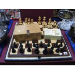 A Rosewood and Birds Eye Maple Chessboard, together with large chess set, in Lardy International