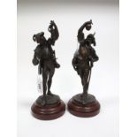 A Pair of Late XIX Century Continental Bronzes, each as a medieval warrior, part dressed in