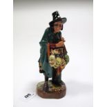 A Royal Doulton Pottery Figure, The Mask Seller, HN 2103., 22.5cms high.