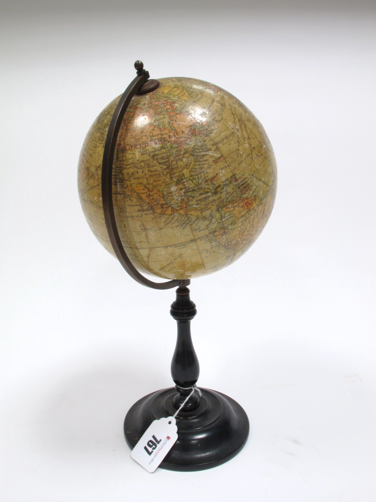 An Early XX Century "Geographica" 6" Terrestrial Globe, on a turned and ebonised wood stand, 31cms