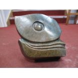 A Light Green Stone Sculpture of abstract form, 41cms high.