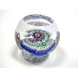 A 1970's Whitefriars Paperweight, with concentric millefiore canes within clear printie cut dome