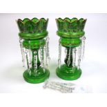 A Pair of Victorian Green Glass Lustres, enamelled and gilt with bands of flowers and other