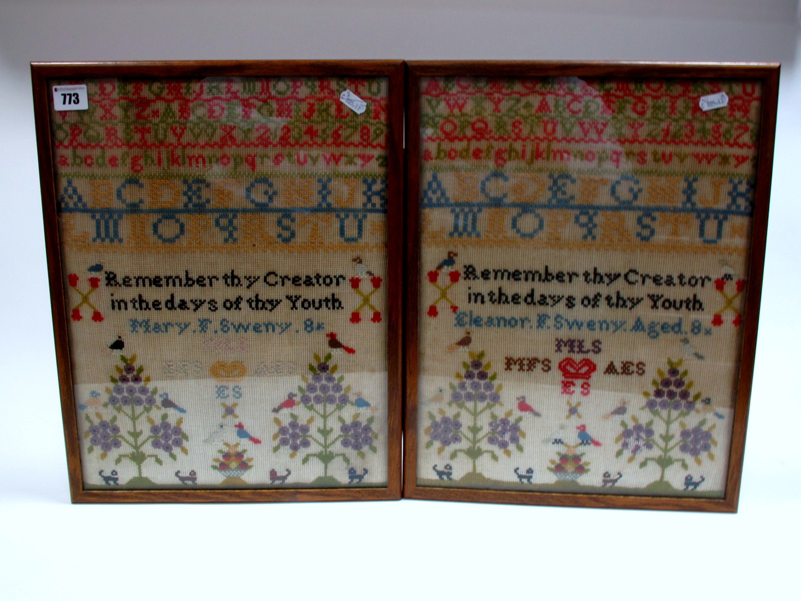 A Pair of Victorian Needlework Samplers, respectively by Mary F. and Eleanor F. Sweny, centrally