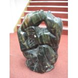 An Abstract Figural Sculpture, depicting an embracing couple, 56cms high.