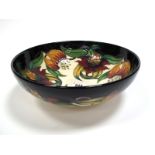 A Moorcroft Pottery Circular Bowl, tubelined and decorated in the Anna Lily design by Nicola Slaney,