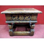 A Titchmarsh & Goodwin Style Oak Glove Box, with hinged lid and frieze carved with "A" on turned and