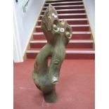 A Green Stone Abstract Figural Sculpture, 82.5cms high.