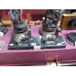 After Irene Rochard, a Bronzed Depiction of Two Seated Deer, on veined black marble plinth, in the