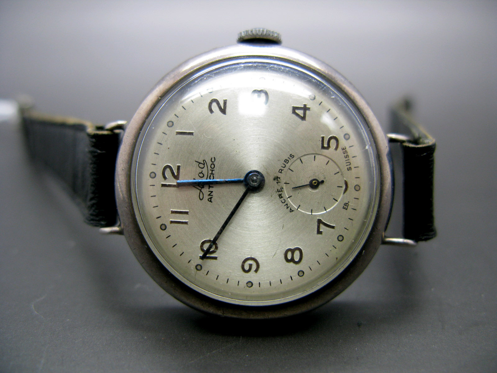 MOD Antichoc; A Continental Cased Trench Style Gent's Wristwatch, the signed dial with Arabic
