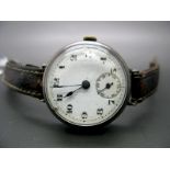 A Continental Cased Trench Style Gent's Wristwatch, the signed dial with Arabic numerals and seconds